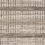 Broadloom carpet swatch in a stripe pattern in a brown design