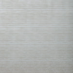 Detail of wallpaper in a wavy stripe print in metallic gray.