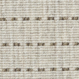 Broadloom carpet detail in a oatmeal field with a brown dotted stripe.