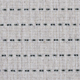 Broadloom carpet detail in a oatmeal field with a forest green stripe.