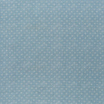 printed linen fabric in a clustered dot pattern in cream on a sky blue field.