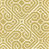 Detail of wallpaper in a geometric lattice print in gold on a cream field.