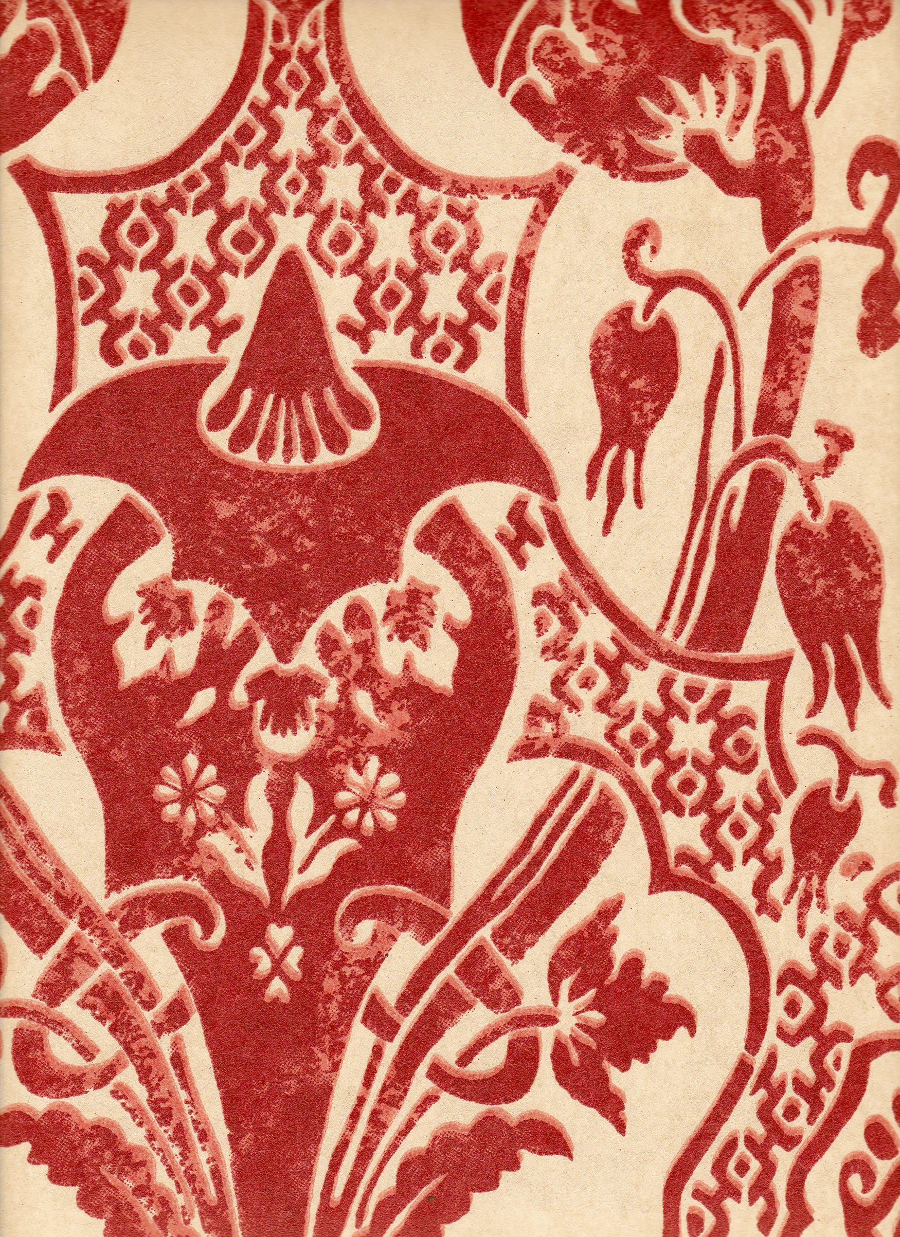 Detail of wallpaper in a damask vase print in red on a cream field.