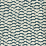 Fabric in a repeating abstract print in navy on a cream field.