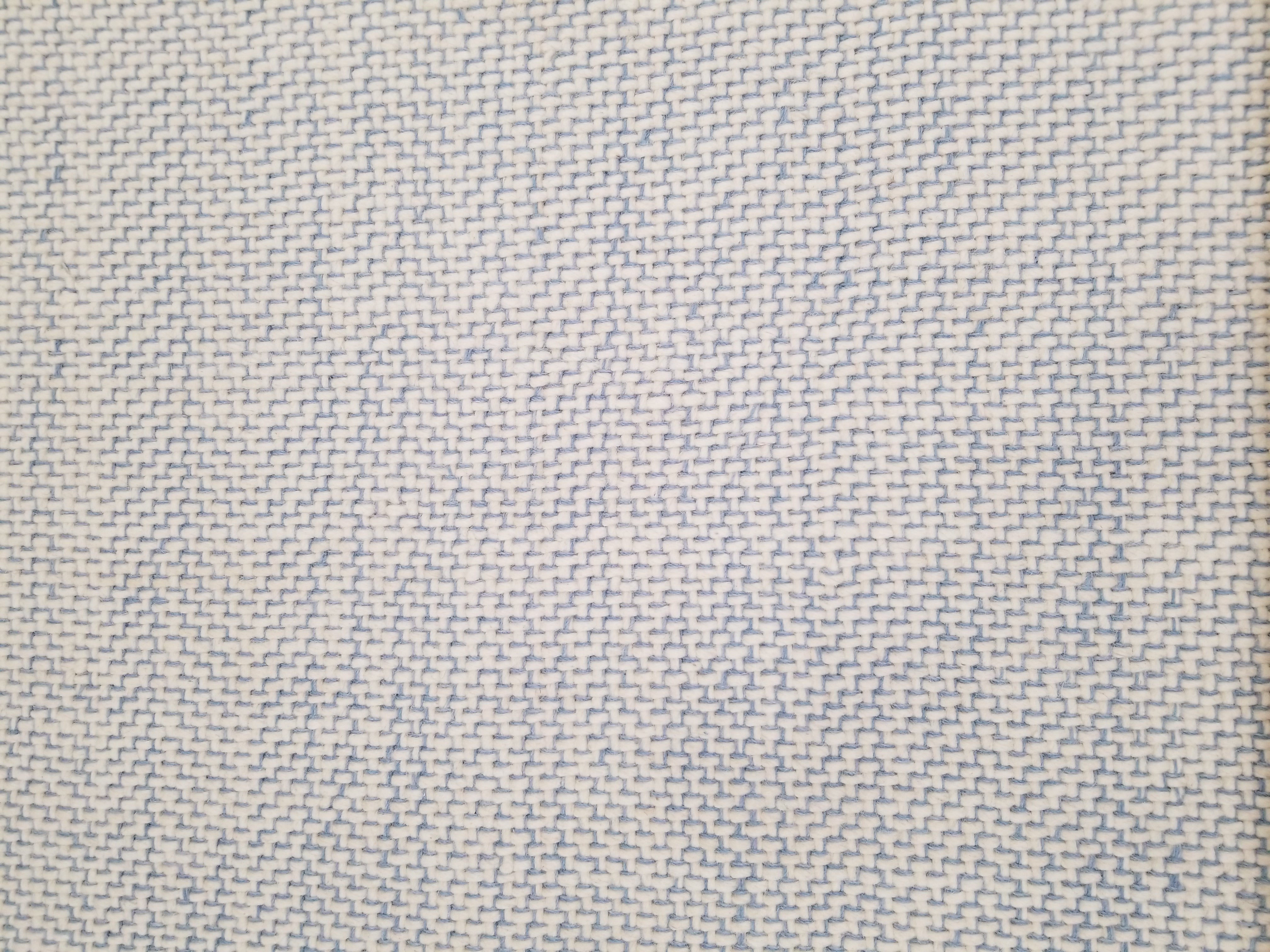 Berlin rug in textural design in blue and white stitching