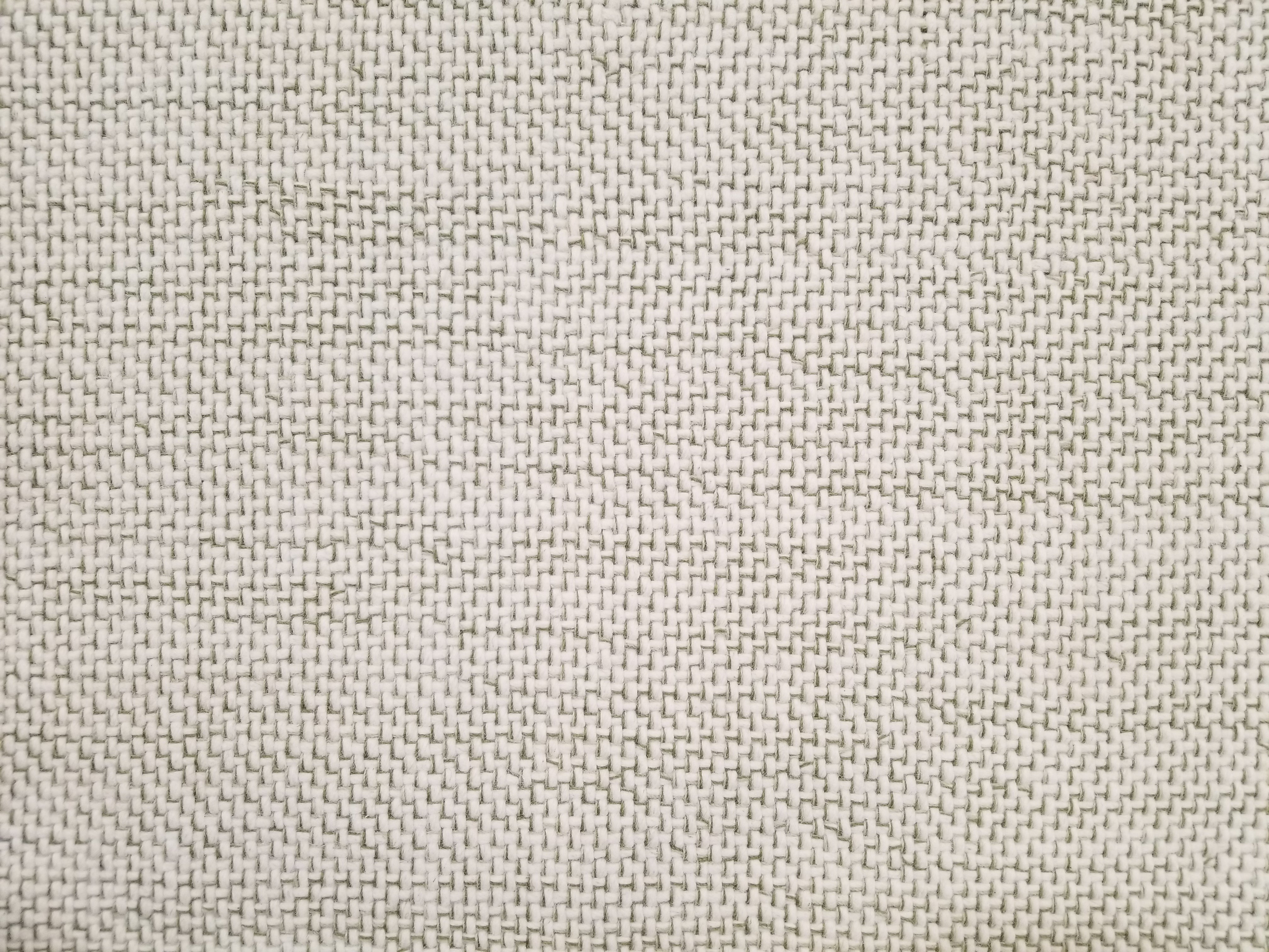 Berlin rug in textural design in beige and olive green stitching