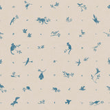 Detail of wallpaper in a playful animal and branch print in blue on a cream field.