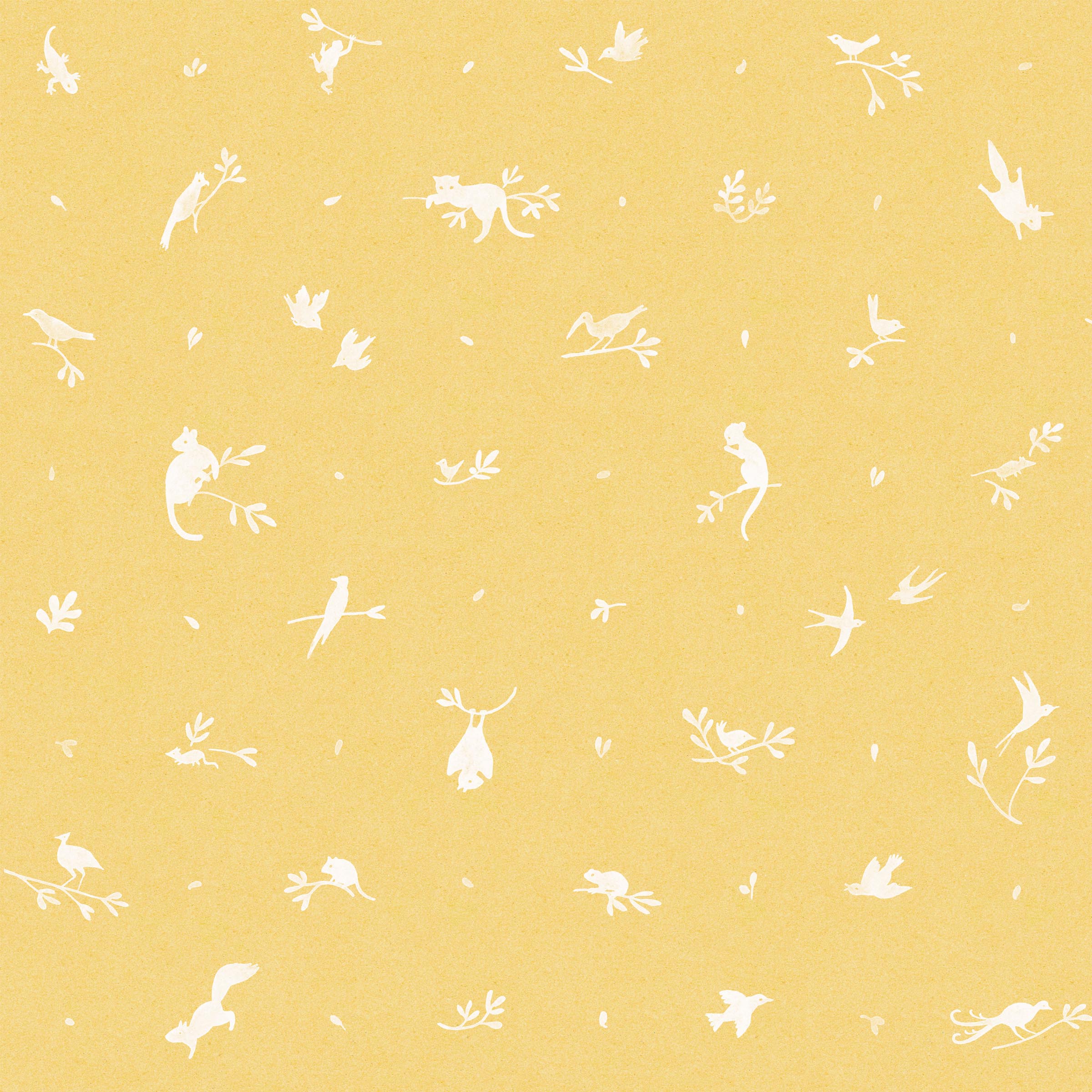 Detail of fabric in a playful animal and branch print in white on a yellow field.