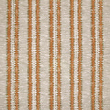 Detail of fabric in a dense tribal stripe pattern in shades of cream, orange and olive green. 
