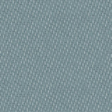 Detail of wallpaper in a small-scale dot and dash pattern in shades of blue on a blue-gray field.