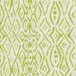 Detail of fabric in a painterly geometric grid in green on a cream field.
