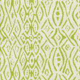 Detail of fabric in a painterly geometric grid in green on a cream field.