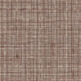 Close up detail of wallpaper in a textured tweed pattern in shades of muted mauve purple. 