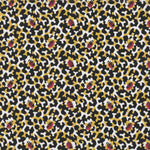 Detail of fabric in a playful irregular botanical print in red, yellow and black on a white field.