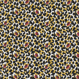 Detail of fabric in a playful irregular botanical print in red, yellow and black on a white field.