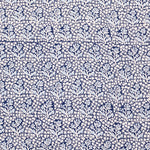Navy blue fabric with a white floral pattern
