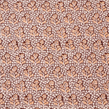 Patterned fabric with small floral design on a brown background