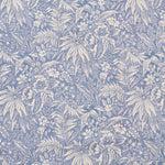 Floral and leaf pattern in blue and white on a blue background