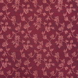 Performance fabric with a scrolling floral design in magenta pink 