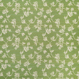 Performance fabric with a scrolling floral design in green. 