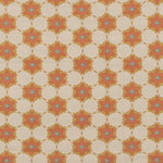 Woven fabric in a floral lattice print in orange, red and blue on a tan field.