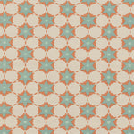 Woven fabric in a floral lattice print in blue and coral on a tan field.