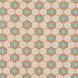 Woven fabric in a floral lattice print in blue and coral on a tan field.