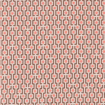 Fabric in a geometric grid print in shades of pink and brown on a tan field.