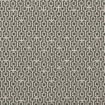 Fabric in a geometric grid print in shades of olive and brown on a tan field.