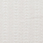 Fabric with an embroidered linear leaf print in white on a white field.