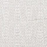 Fabric with an embroidered linear leaf print in white on a white field.