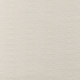 Fabric with an embroidered linear leaf print in cream on a cream field.