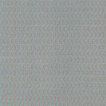 Fabric in an undulating stripe pattern in coral and white on a blue field.