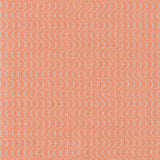 Fabric in an undulating stripe pattern in light blue and white on a coral field.