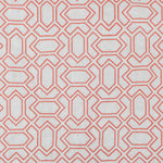 Fabric with an embroidered geometric grid print in coral on a light gray field.