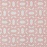 Fabric with an embroidered geometric grid print in coral on a light gray field.