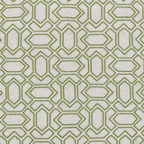 Fabric with an embroidered geometric grid print in olive on a light gray field.