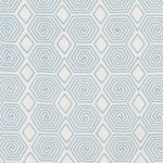 Fabric with a playful embroidered geometric grid print in light blue on a white field.