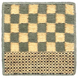 Flatweave rug sample in a blue and cream checkerboard with striped border.