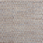 A handwoven rug with a herringbone weave in white with striated yarns of blue cream and brown.
