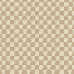 Detail of printed wallpaper in a watercolor ikat-inspired checkerboard pattern in tonal shades of warm beige.