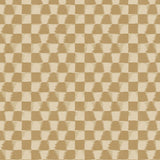 Detail of printed wallpaper in a watercolor ikat-inspired checkerboard pattern in tonal shades of muted ochre.