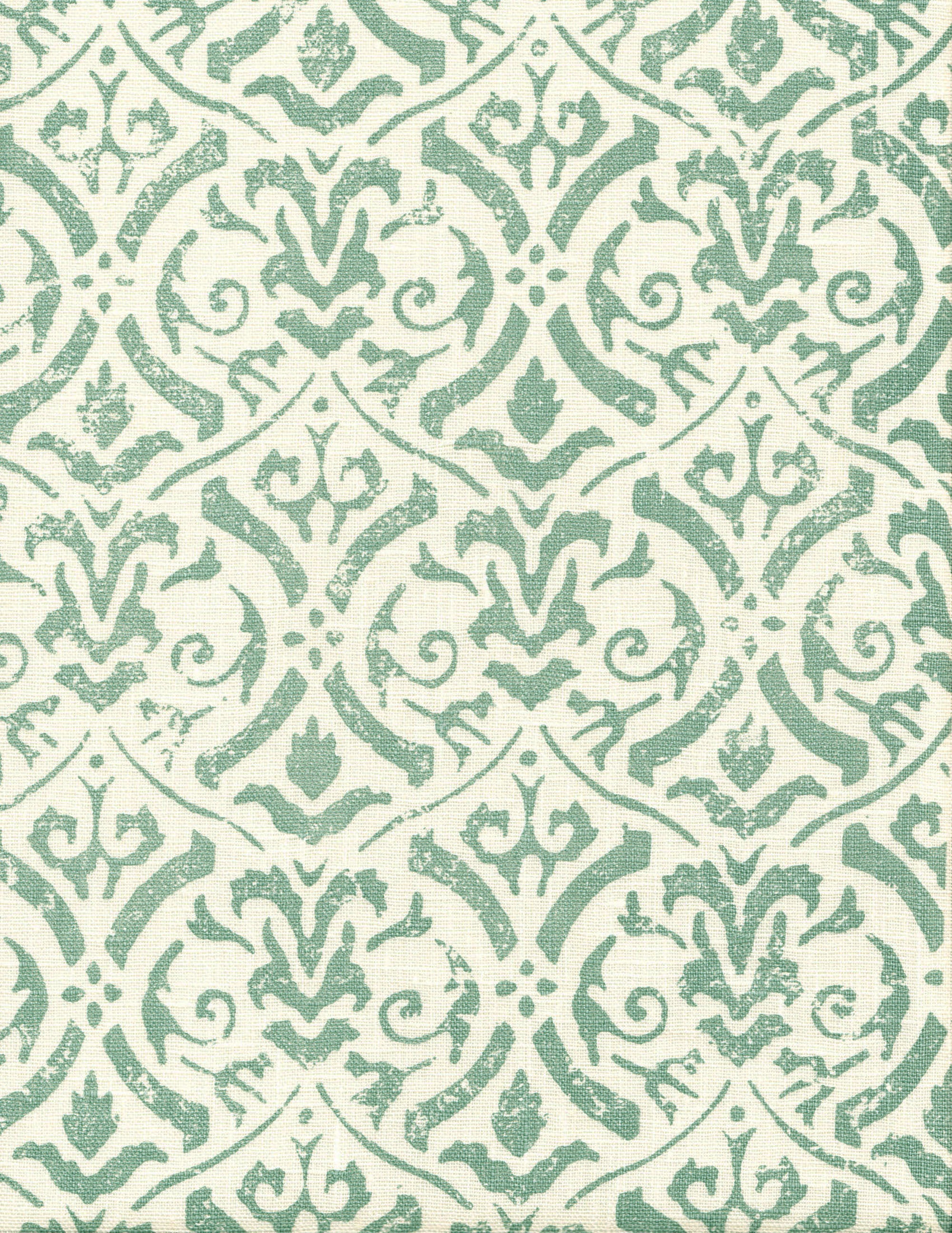 Detail of fabric in a botanical damask print in turquoise on a cream field.