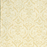 Detail of fabric in a botanical damask print in tan on a cream field.