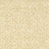 Detail of fabric in a botanical damask print in tan on a cream field.