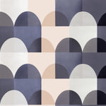 Detail of wallpaper in a curvy geometric print in shades of white, tan, purple and gray.