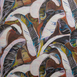 Close up of wallpaper with linear painterly banana-leaf pattern in lilac, white, yellow, black and blue on a rust red and brown background. 