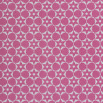 Wallpaper in a floral lattice print in cream on a magenta field.