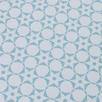 Wallpaper detail in a floral lattice print in powder blue on a cream field
