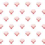 Detail of wallpaper in a playful bouquet print in orange and red on a white field.